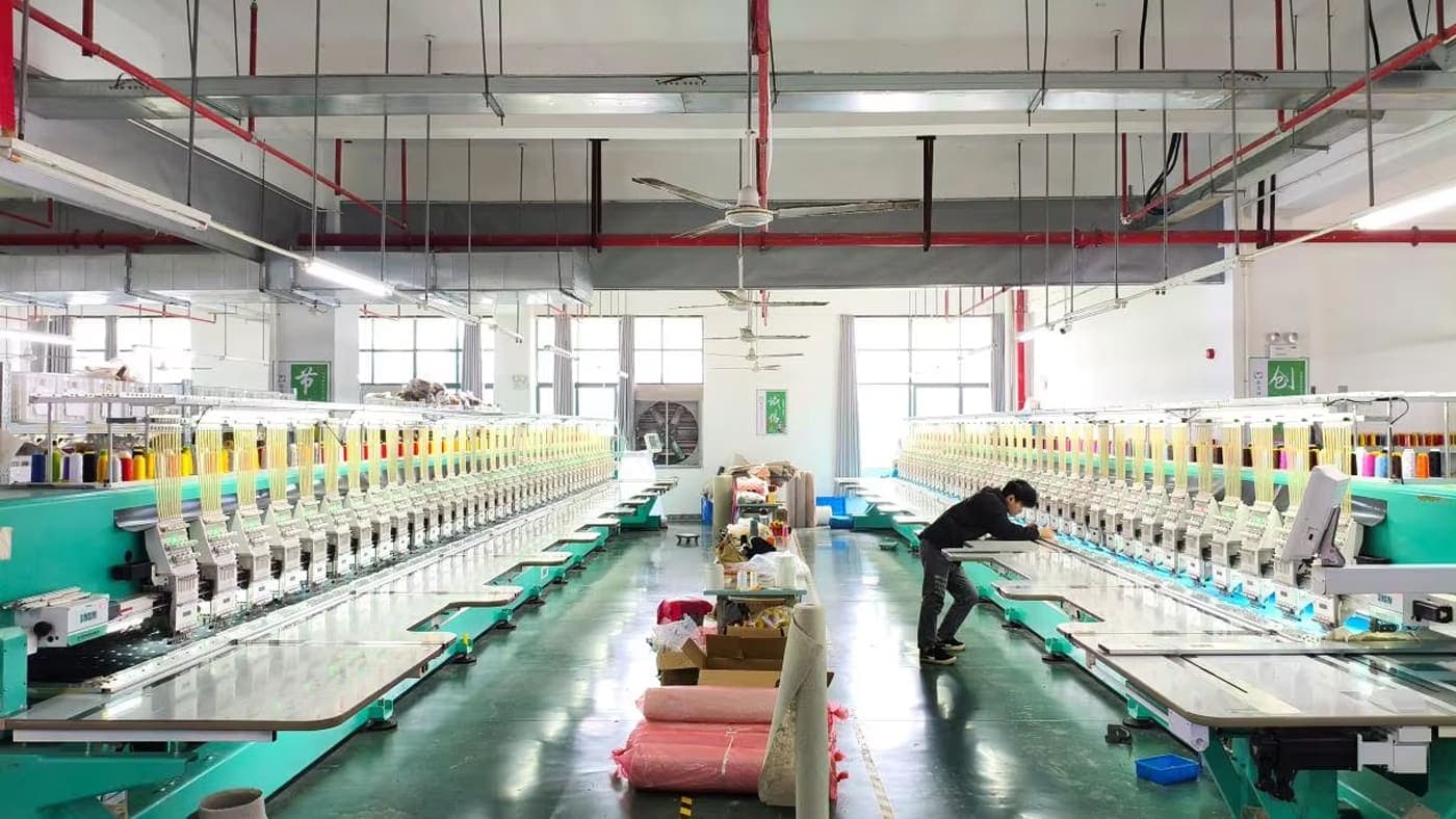 Custom embroidery on plush toy — 12-needle embroidery machine line at StarDream Toys factory